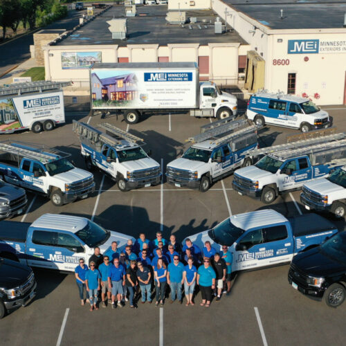 Minnesota Exteriors team with trucks ready to deliver exceptional home remodeling services