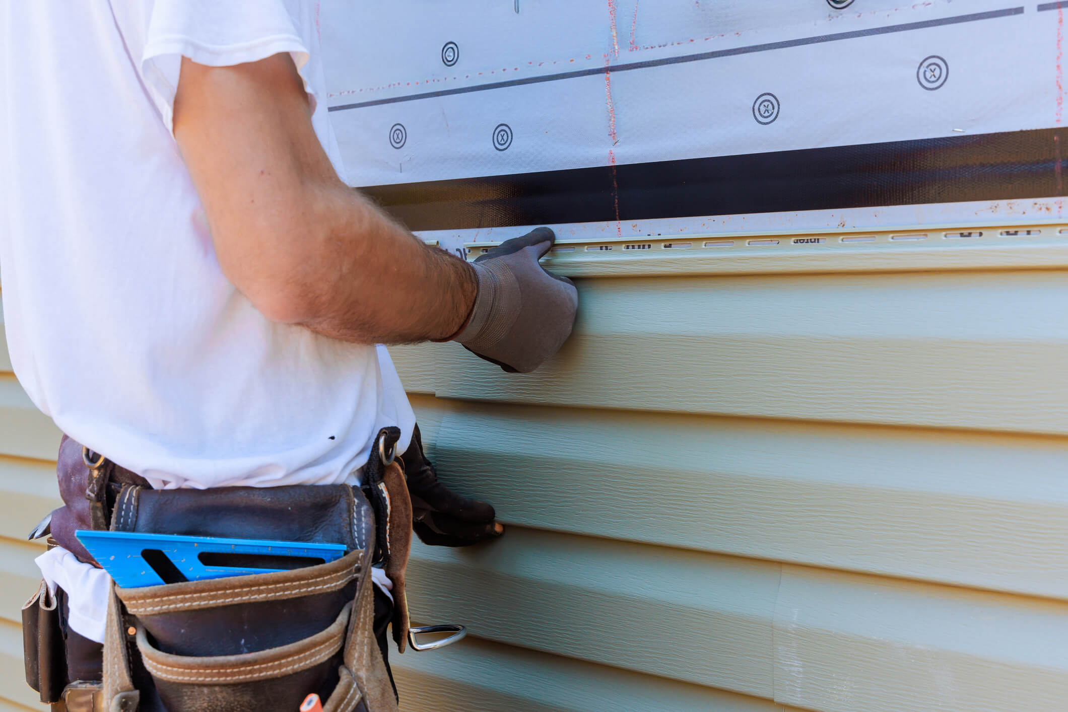 person installing vinyl installation